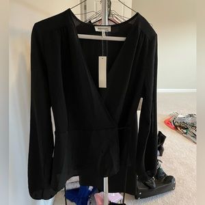 Sheer black wrap blouse.  Very feminine super cute!